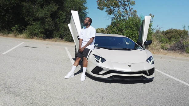 Problem flexes up in his new visual to 'Lamborghini'